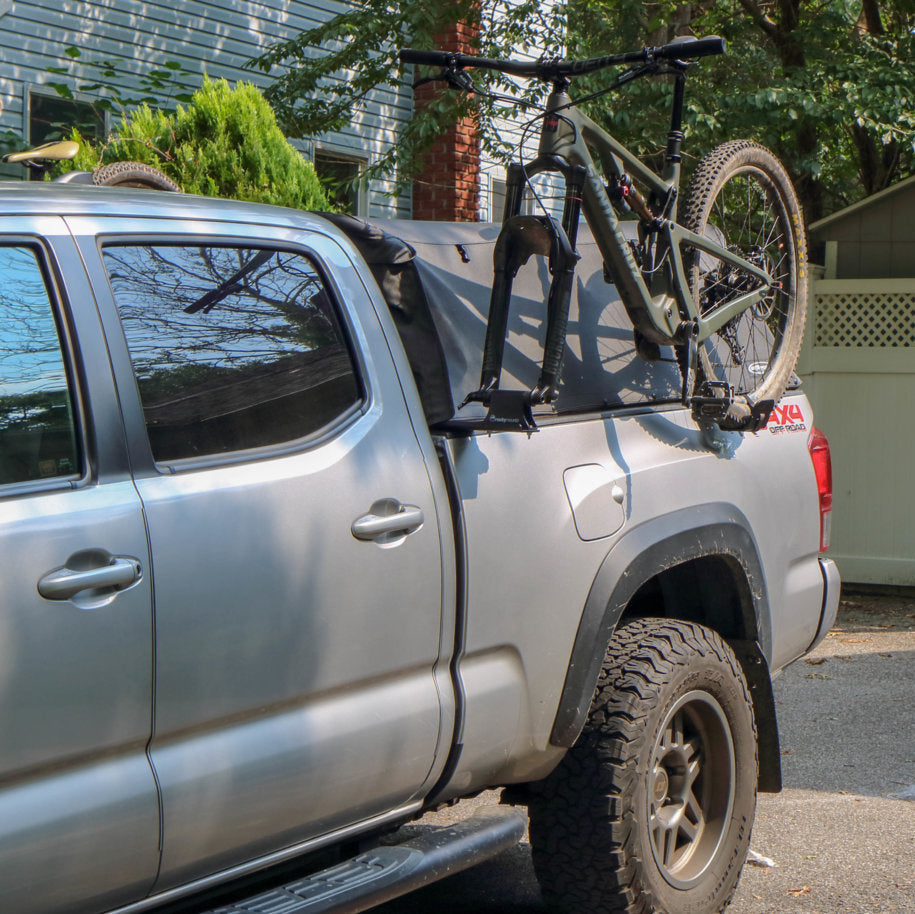 Gray Tacoma carrying bike on SideRide side mount